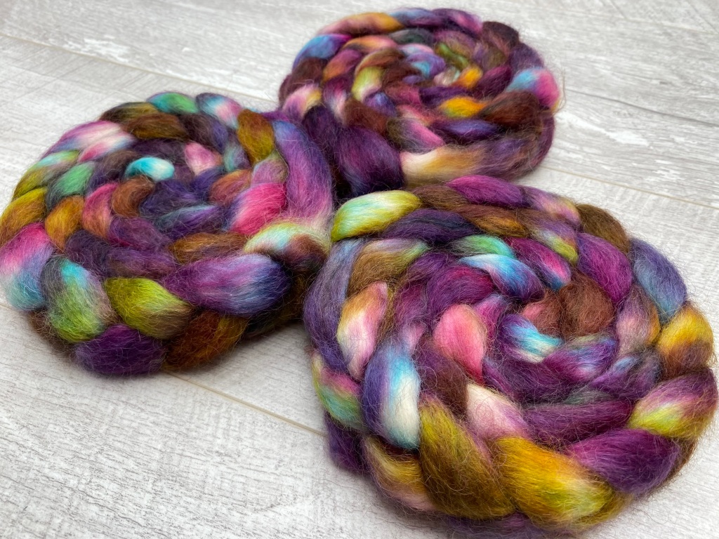 3 batts of spinning fibre in shades of purple, gold and green 